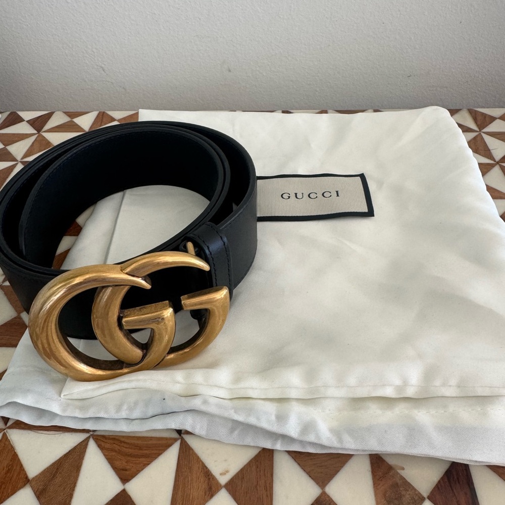 Gucci Black and Gold Belt with Iconic GG Buckle